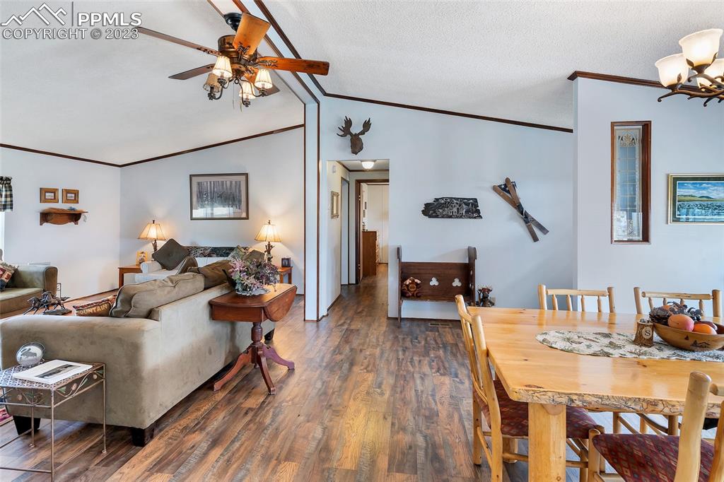 75 6th Street Como, CO 80432 - Photo 17 of 35 a living room with furniture and wooden floor