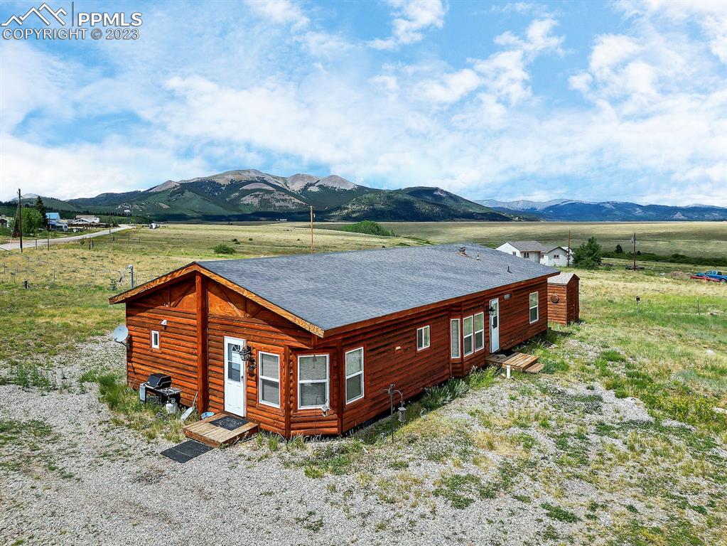 75 6th Street Como, CO 80432 - Photo 6 of 35 a view of a terrace with a lake view