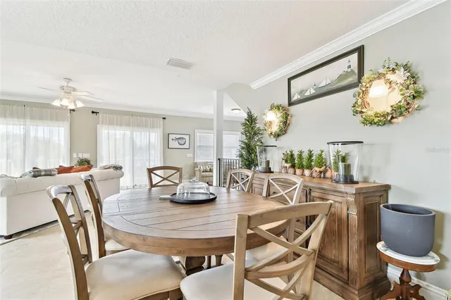 a kitchen with stainless steel appliances granite countertop a refrigerator stove and sink