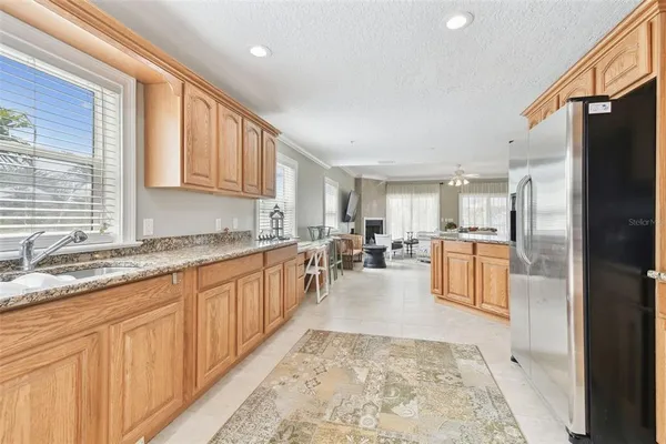 a en suite bathroom with a toilet sink and mirror