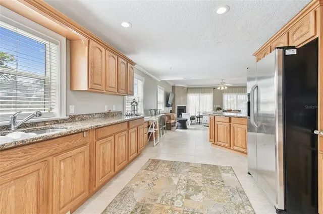 a view of a chair and table in the balcony