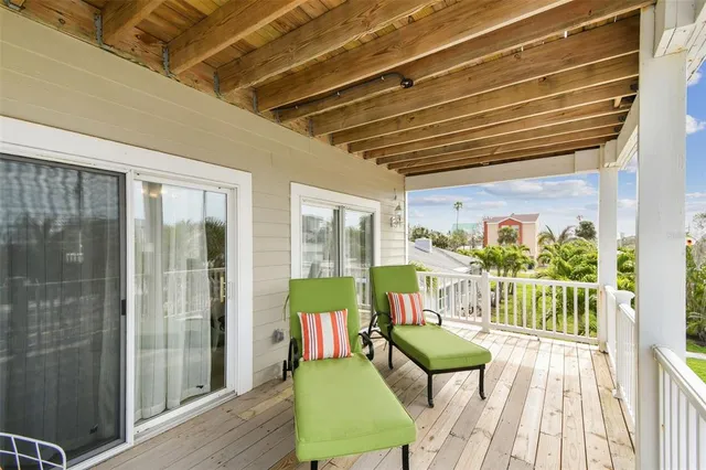 a bed room with a bed and a chandelier