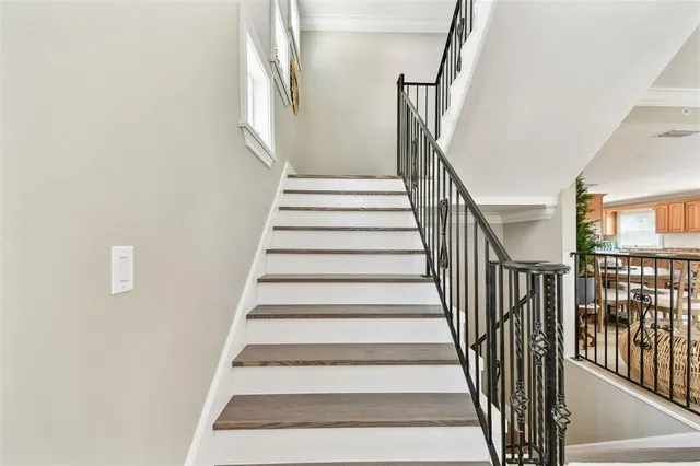 a bathroom with a shower and a door