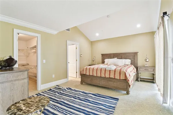 a bathroom with a shower and a door