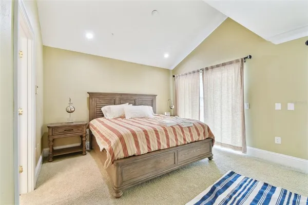 a view of a balcony with wooden floor
