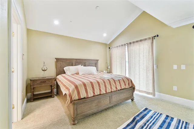 a view of a balcony with wooden floor