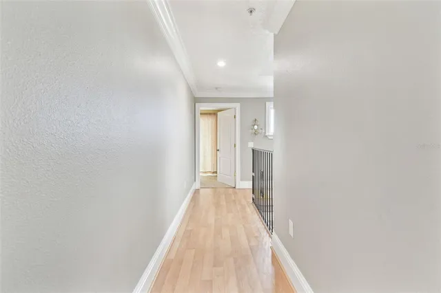 a view of a balcony with wooden floor