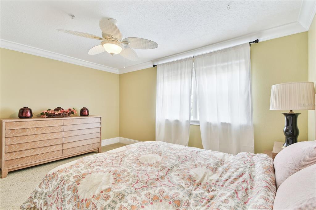 16033 Gulf Boulevard Redington Beach, FL 33708 - Photo 49 of 98 a bed room with a bed and a window