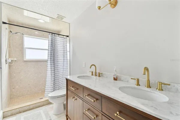 an aerial view of residential building with outdoor space