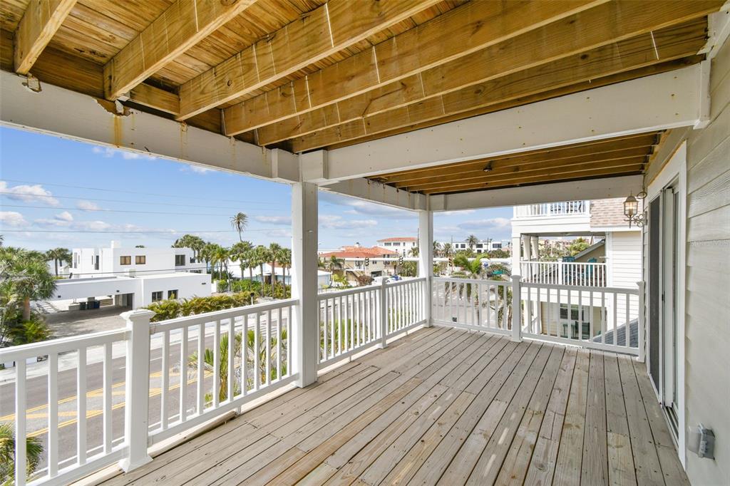 16033 Gulf Boulevard Redington Beach, FL 33708 - Photo 59 of 98 a view of a balcony with wooden floor