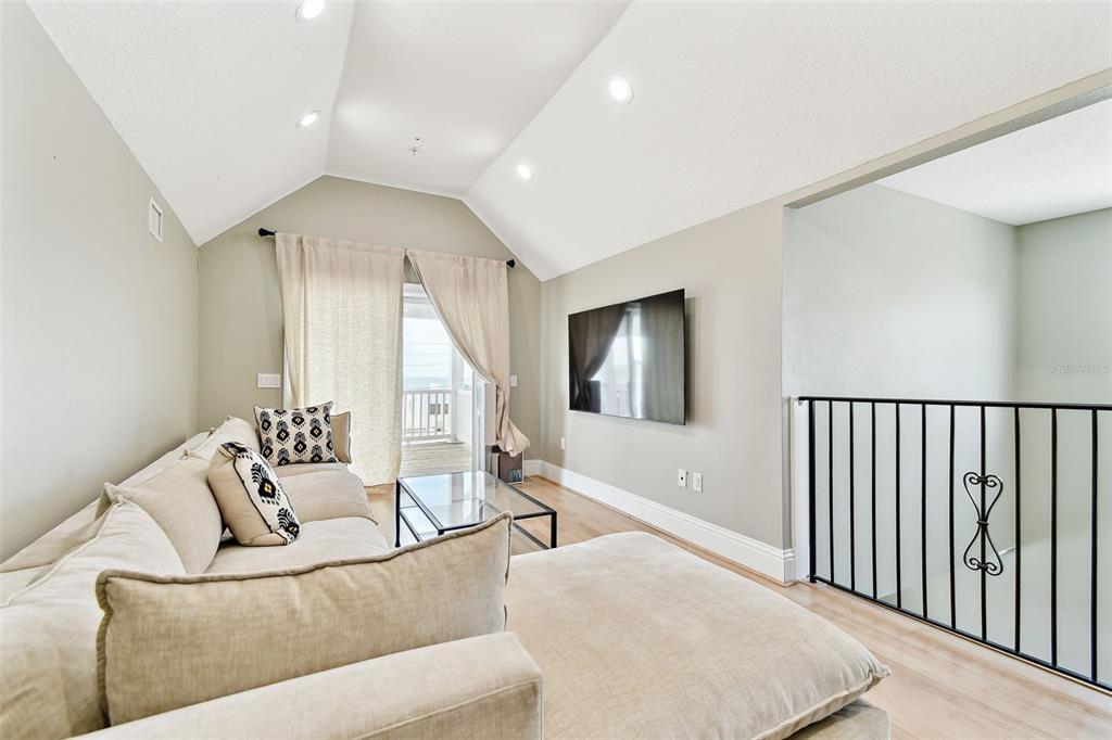 16033 Gulf Boulevard Redington Beach, FL 33708 - Photo 64 of 98 a living room with furniture and a large window