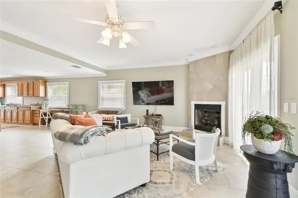 a living room with furniture and a window