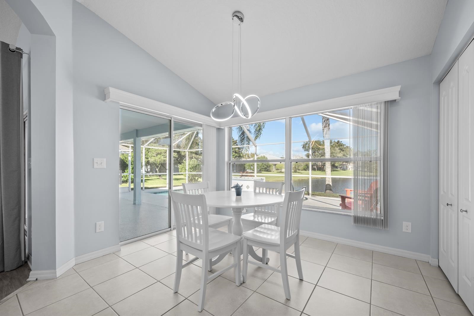 1116 Compass Row St. Augustine, FL 32080 - Photo 22 of 68 Breakfast Nook featuring vaulted ceiling, a water view, and light tile patterned floors