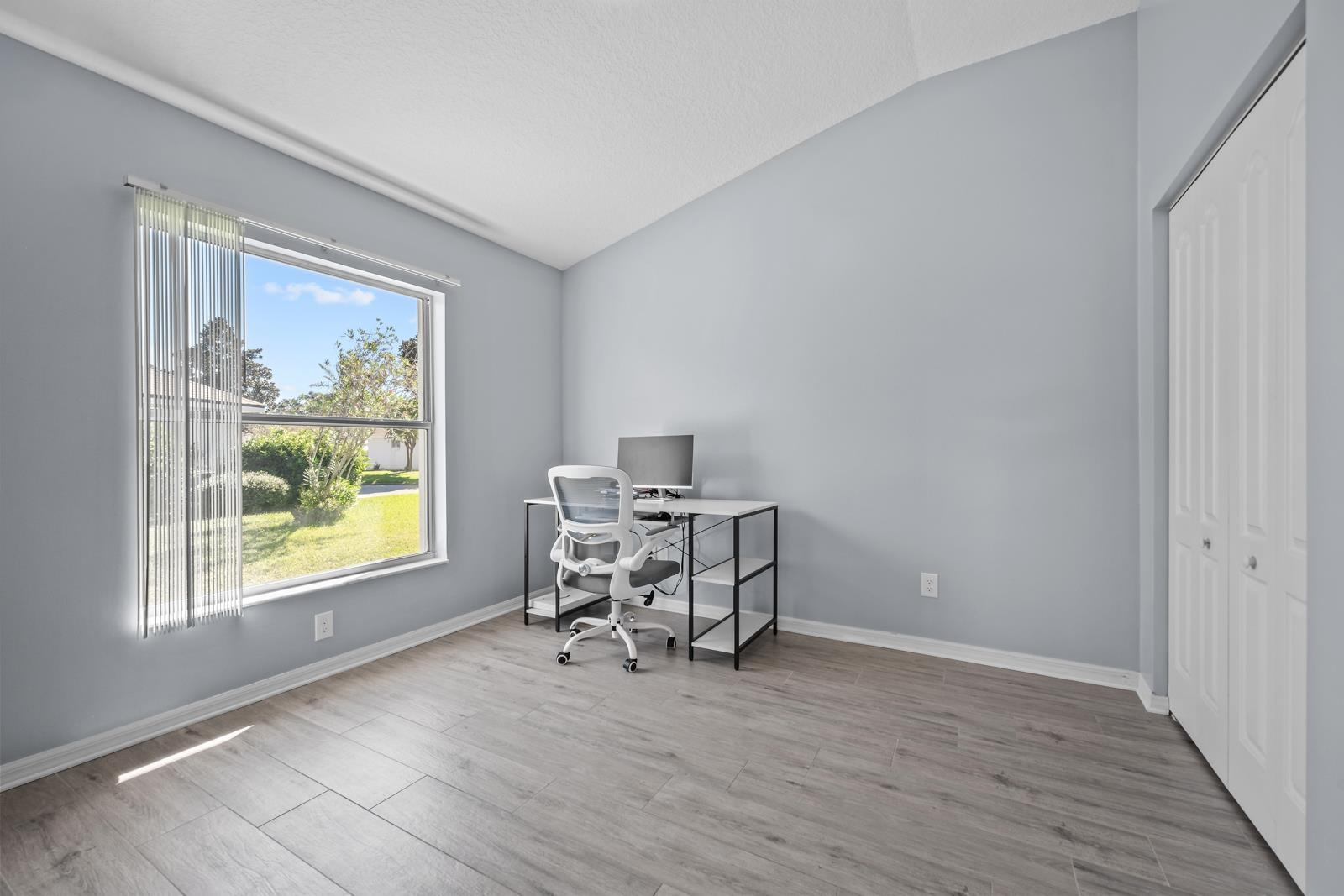 1116 Compass Row St. Augustine, FL 32080 - Photo 33 of 68 Home office featuring vaulted ceiling and light wood finished floors