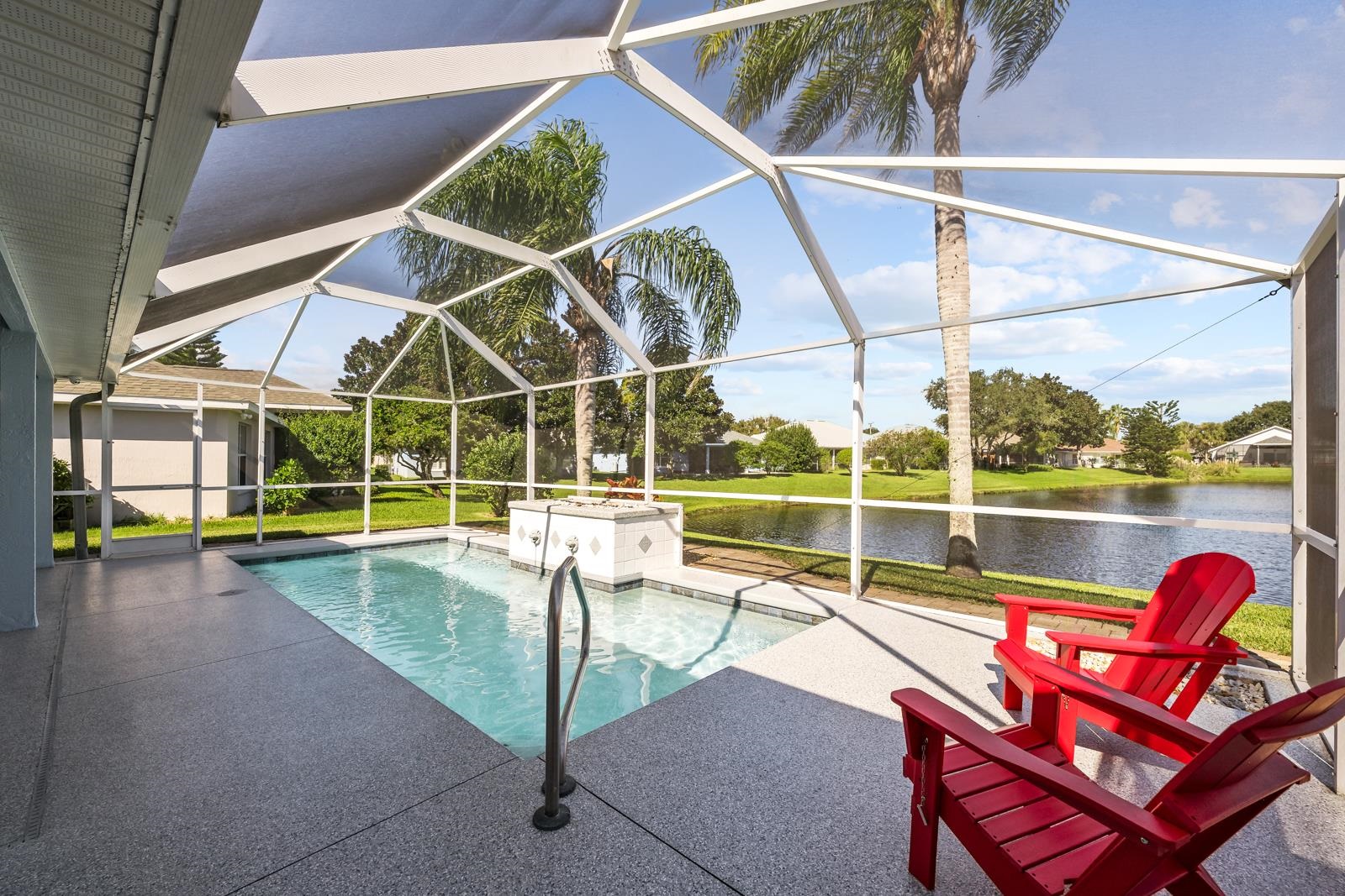 1116 Compass Row St. Augustine, FL 32080 - Photo 40 of 68 Outdoor pool with a sunroom, a patio, a water view, a lanai, and a yard