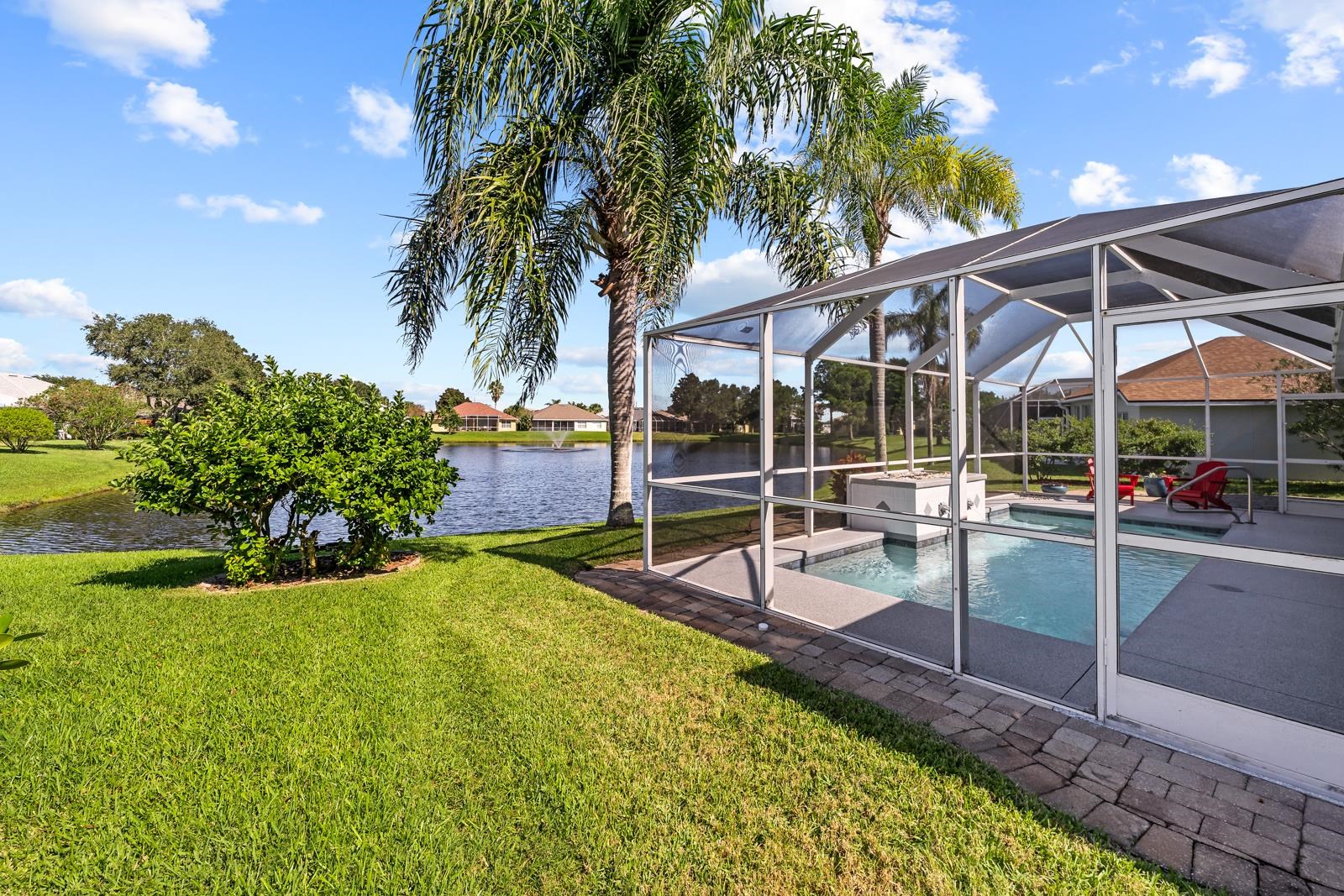 1116 Compass Row St. Augustine, FL 32080 - Photo 50 of 68 Dock area with an outdoor pool, a patio area, a yard, glass enclosure, and a sunroom
