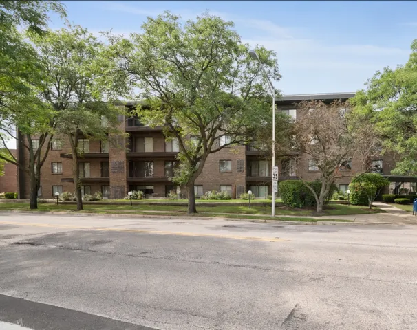 a swimming pool with outdoor seating and yard
