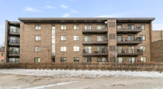 a view of a backyard with sitting area