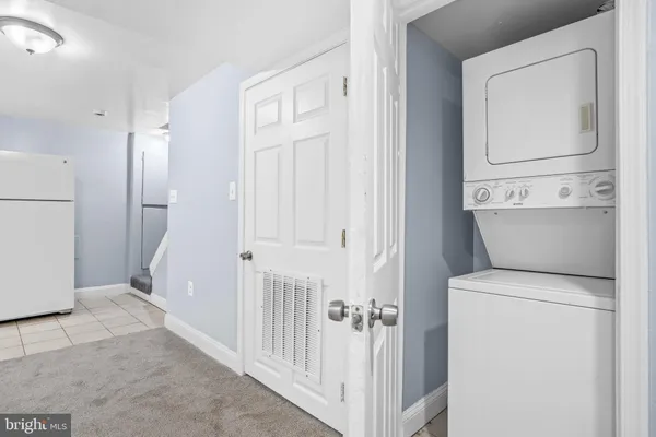 a view of a storage & utility room with washer and dryer