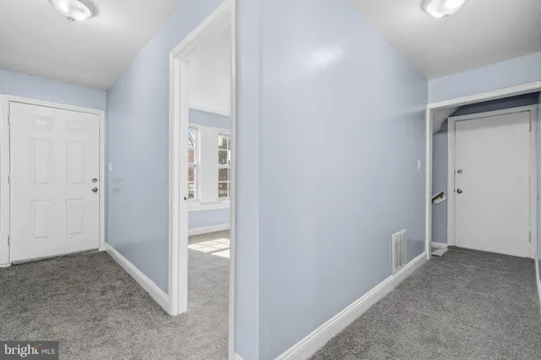 an empty room with an entryway