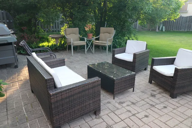 a view of an outdoor sitting area with a couch