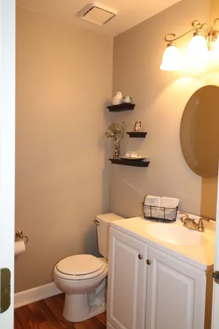 a bathroom with a toilet and a sink