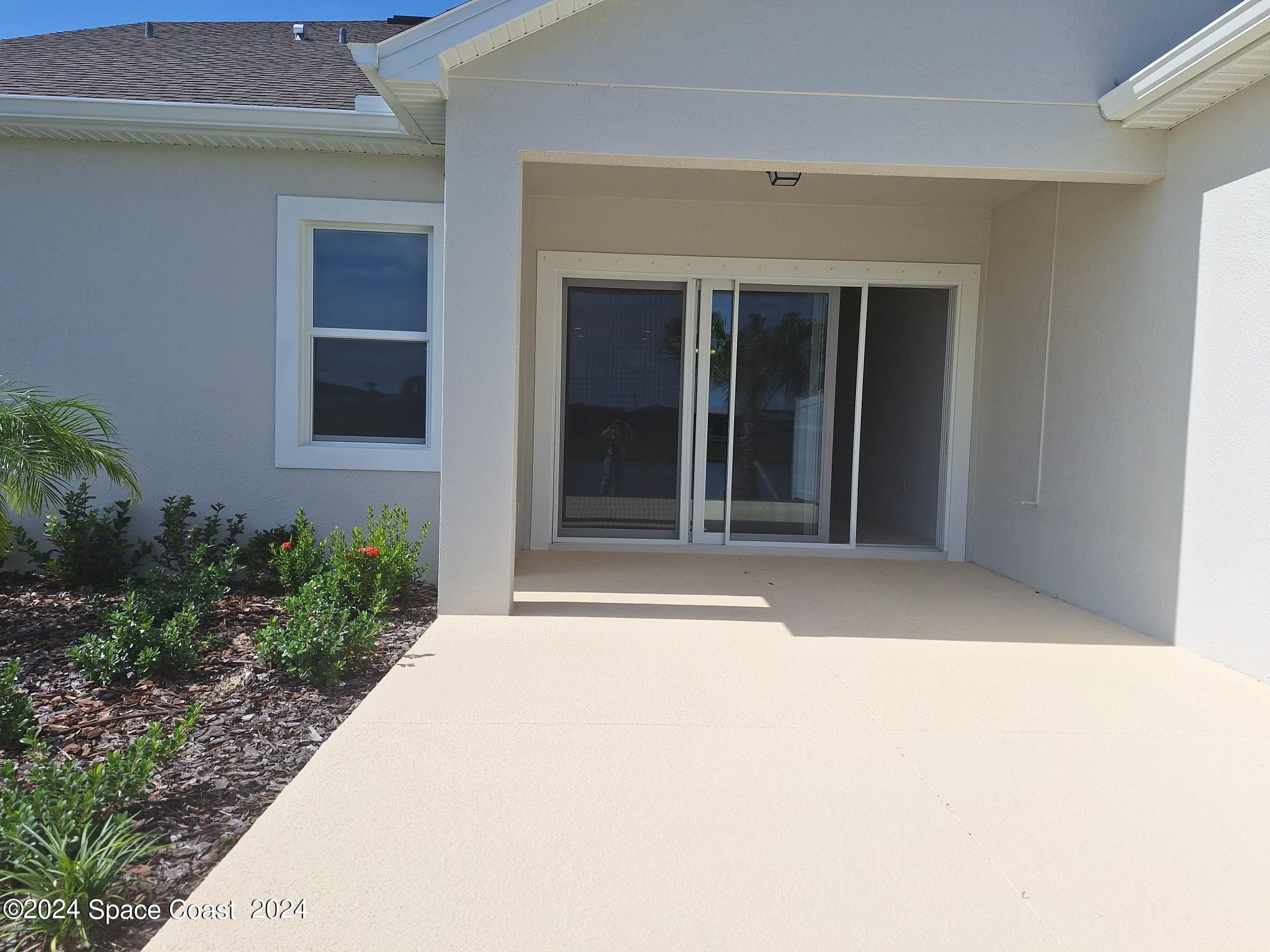 7929 Cache Crk Lane Melbourne, FL 32940 - Photo 19 of 33 a view of entrance front of house