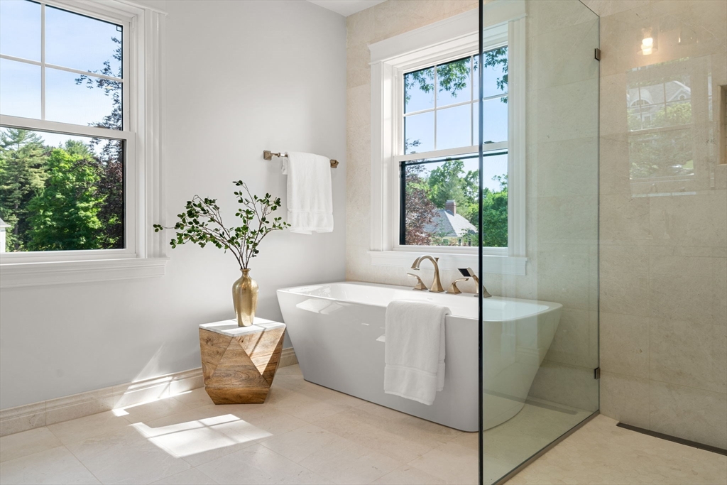 45 Sewall Street Newton, MA 02465 - Photo 13 of 21 a bath tub sitting in a bathroom next to a window