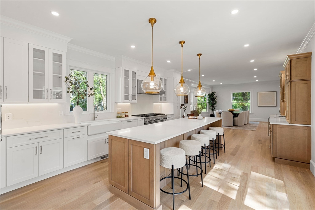 45 Sewall Street Newton, MA 02465 - Photo 3 of 21 a large kitchen with lots of counter space and windows