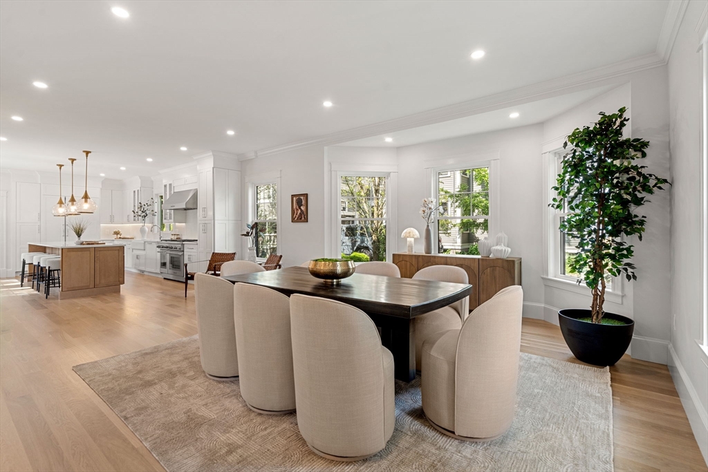 45 Sewall Street Newton, MA 02465 - Photo 4 of 21 a living room with furniture a potted plant and a large window