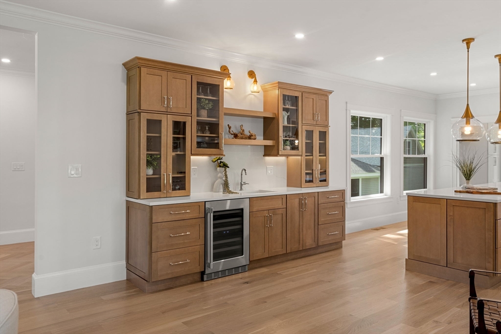 45 Sewall Street Newton, MA 02465 - Photo 5 of 21 a kitchen with stainless steel appliances granite countertop a stove and cabinets