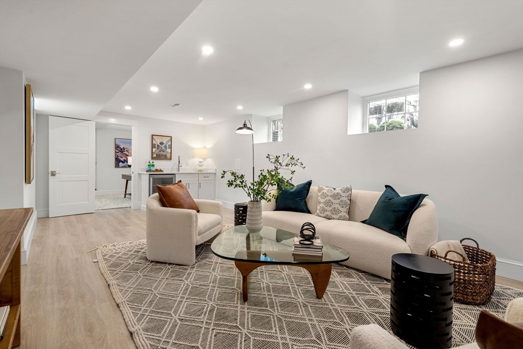 45 Sewall Street Newton, MA 02465 - Photo 10 of 21 a living room with furniture a rug and a table