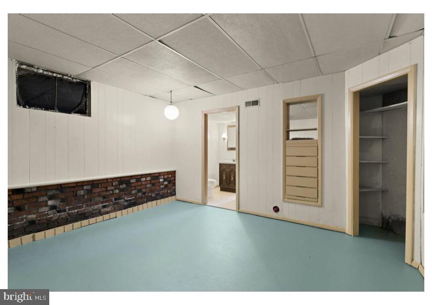 7524 Harmans Road Harmans, MD 21077 - Photo 40 of 40 a view of an empty room with a kitchen