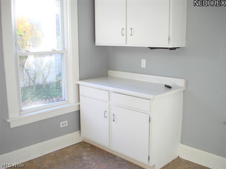 1674 Sunview Road Lyndhurst, OH 44124 - Photo 7 of 23 Renovated kitchen with new flooring and newer windows