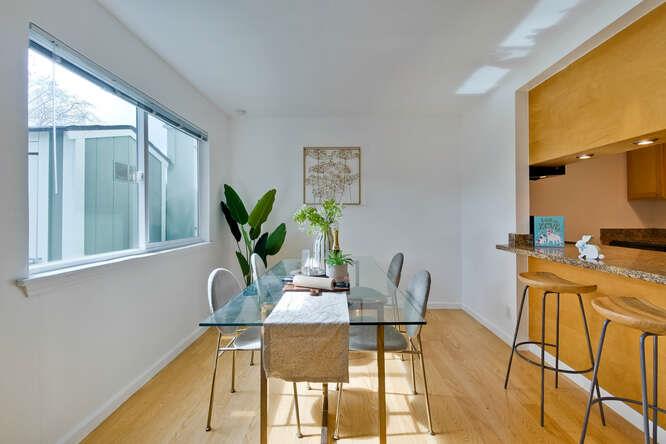1127 Reed Avenue, Unit B Sunnyvale, CA 94086 - Photo 13 of 58 a dining room with furniture and wooden floor