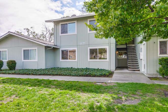 1127 Reed Avenue, Unit B Sunnyvale, CA 94086 - Photo 4 of 58 a front view of a house with a garden