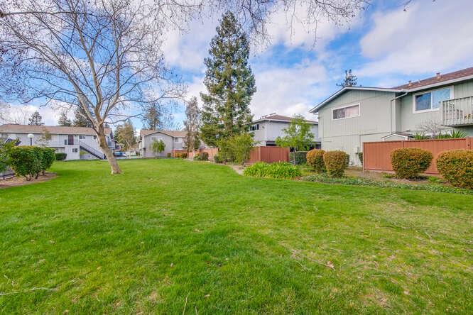 1127 Reed Avenue, Unit B Sunnyvale, CA 94086 - Photo 55 of 58 a view of a house with a yard