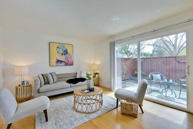 1127 Reed Avenue, Unit B Sunnyvale, CA 94086 - Photo 6 of 58 a living room with furniture and a large window