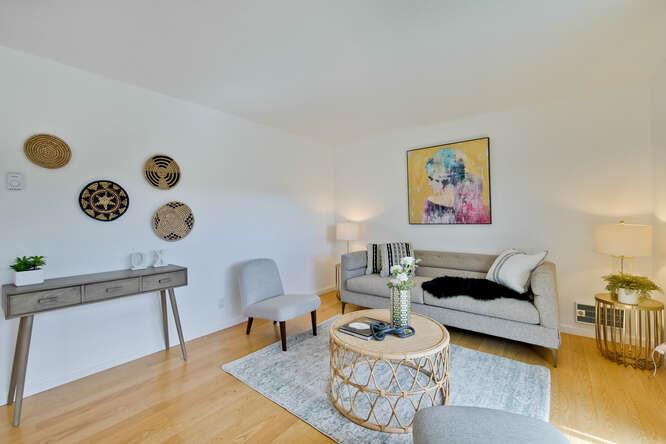 1127 Reed Avenue, Unit B Sunnyvale, CA 94086 - Photo 8 of 58 a living room with furniture and a mirror