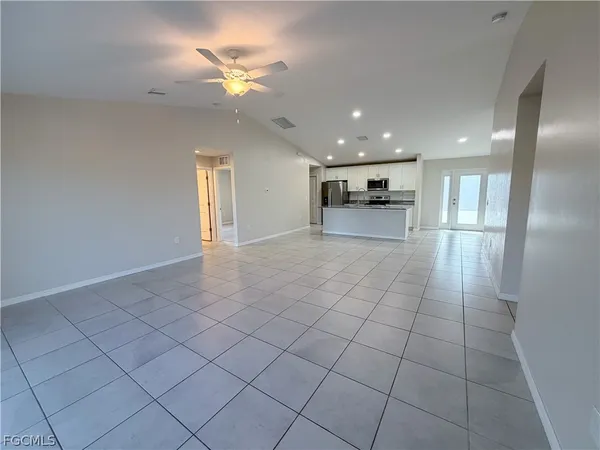 a view of an empty room and window