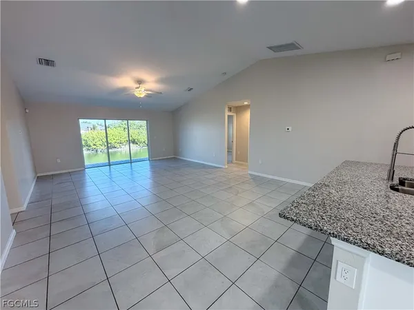a view of an empty room and window