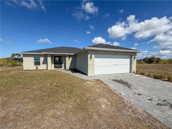 an empty room with closet area
