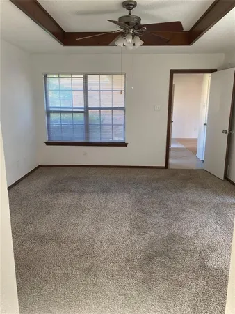 a bathroom with a double vanity sink mirror and tub