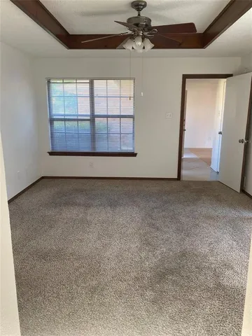 a bathroom with a double vanity sink mirror and tub