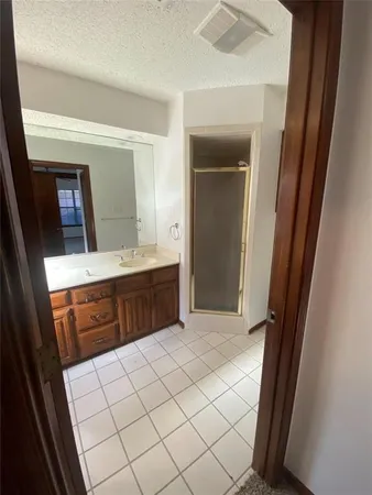 a bathroom with a toilet a sink and bathtub