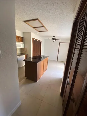 a view of a living room washer and dryer