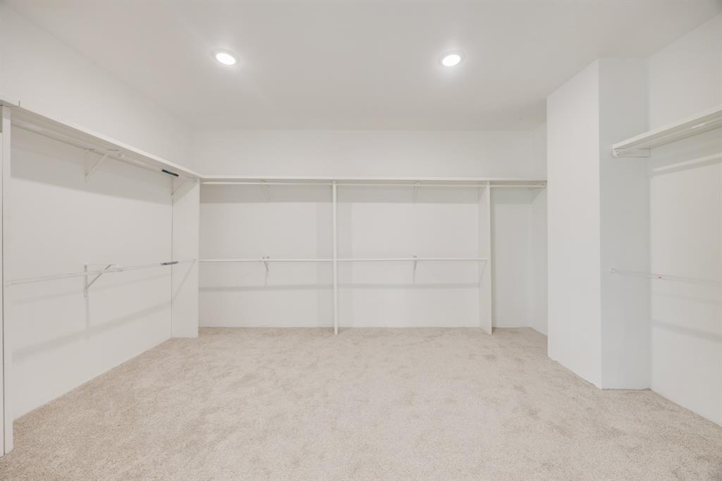 1016 Silver Creek Azle Road Azle, TX 76020 - Photo 16 of 40 Walk in closet featuring carpet flooring
