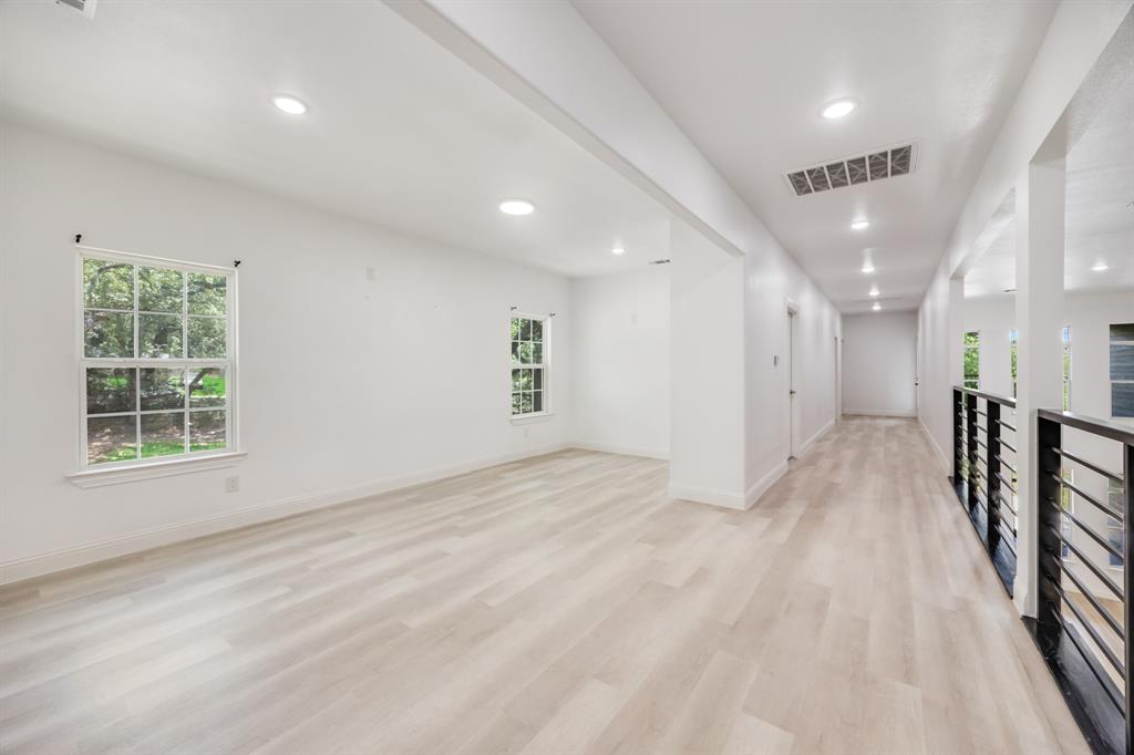 1016 Silver Creek Azle Road Azle, TX 76020 - Photo 23 of 40 Empty room with recessed lighting and light wood-style flooring