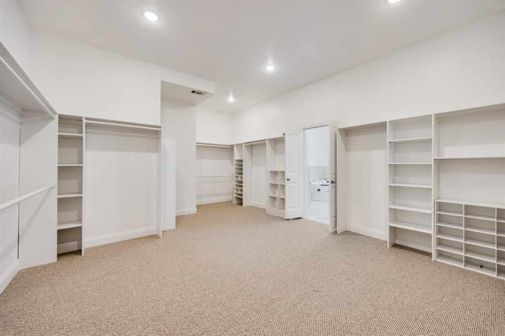 1016 Silver Creek Azle Road Azle, TX 76020 - Photo 26 of 40 Walk in closet featuring carpet floors