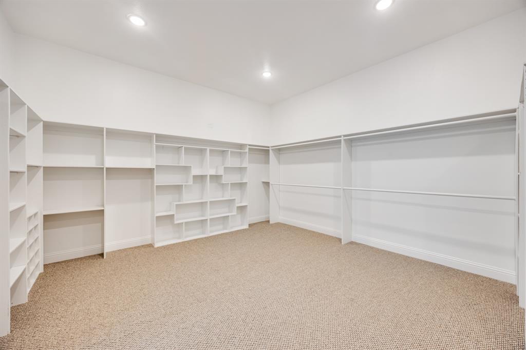 1016 Silver Creek Azle Road Azle, TX 76020 - Photo 27 of 40 Walk in closet with light colored carpet